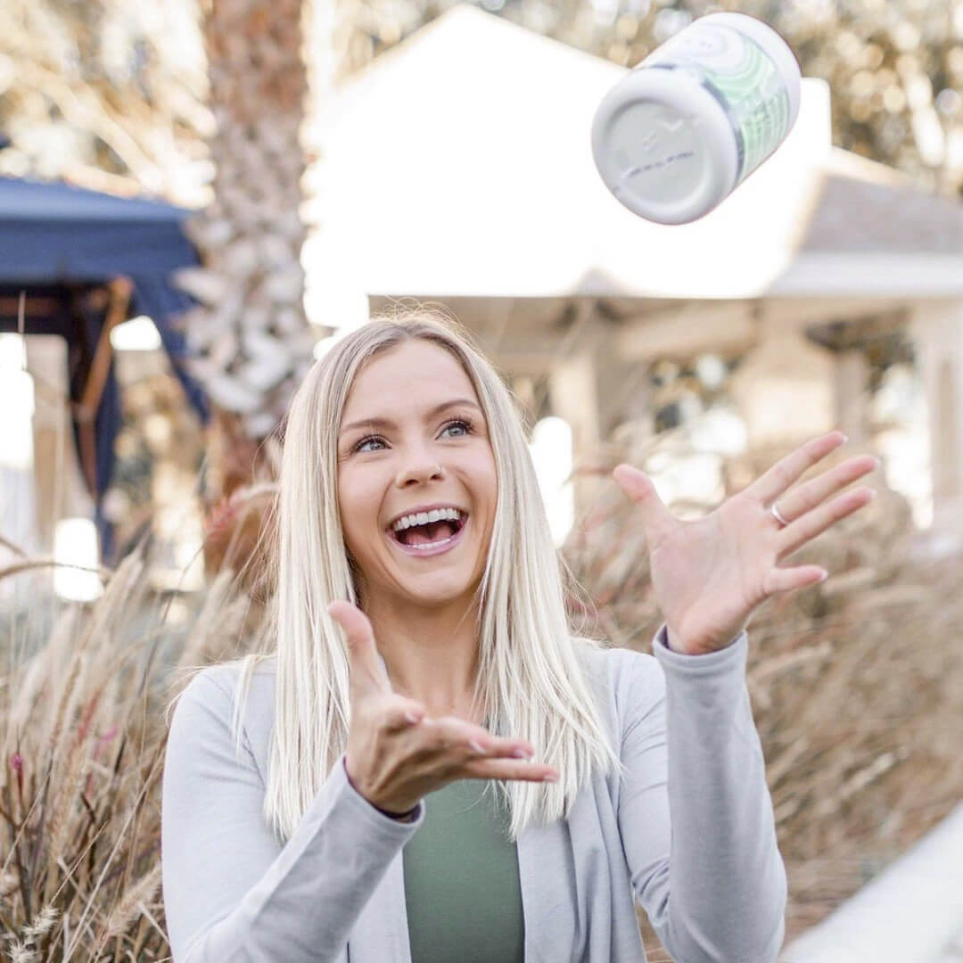 Women tossing product 